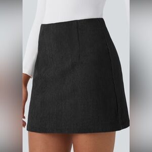 NWT black corduroy skirt, zipper in the back,soft, stretchy shorts underneath!